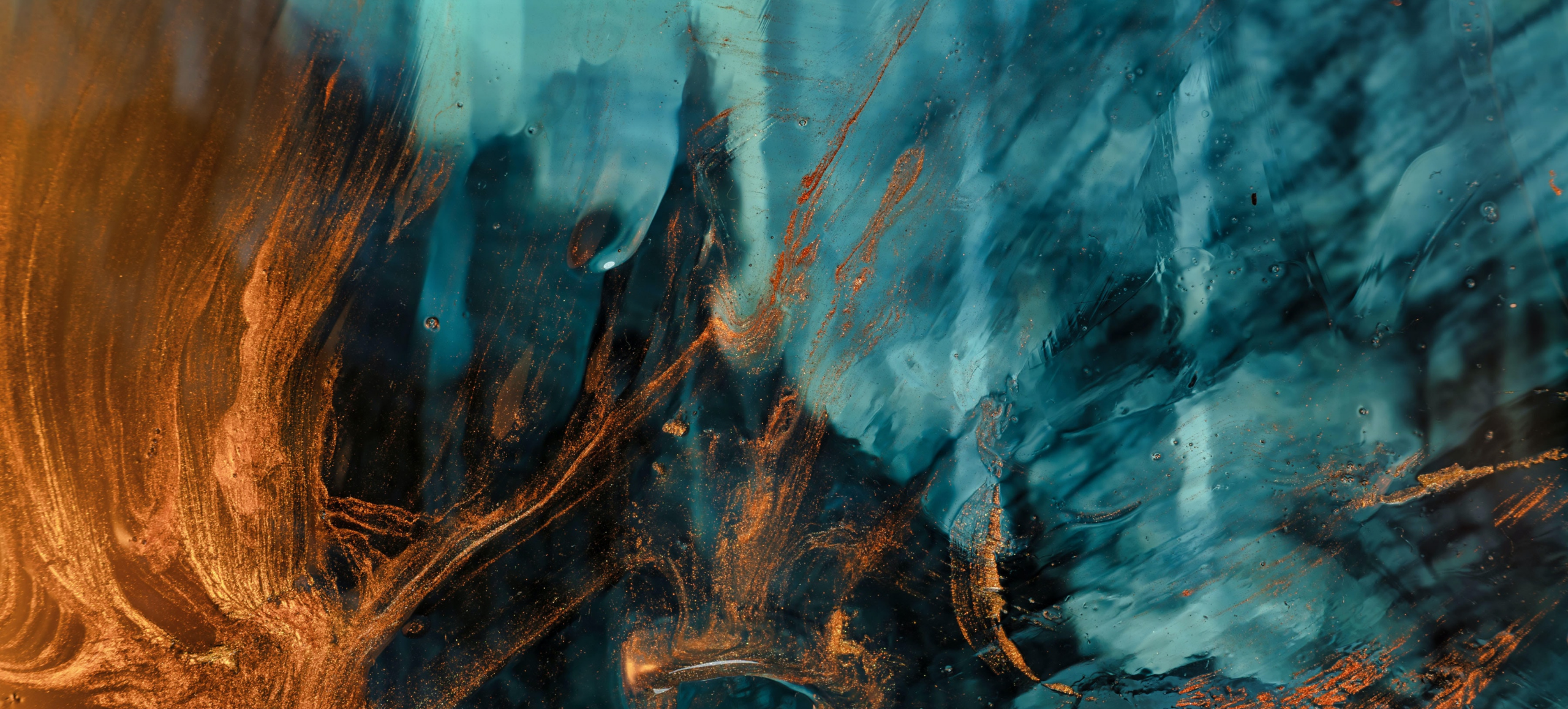 Abstract painting/photo with amorphic swirls of blue, black, and gold