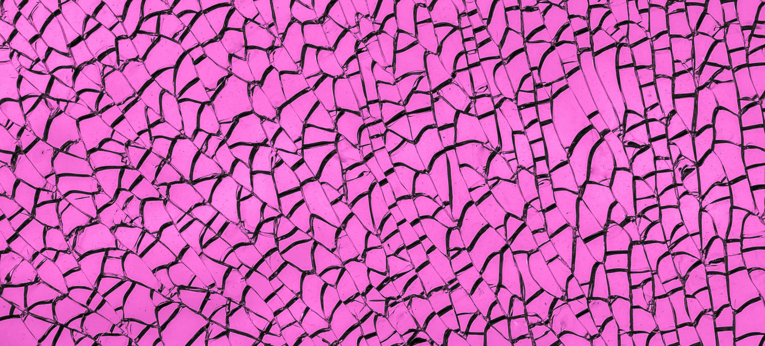 Shattered glass on a hot pink background