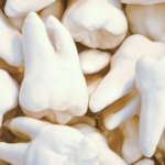 Textured photo of a pile of teeth