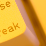 Photo of the pause/break button on a computer keyboard